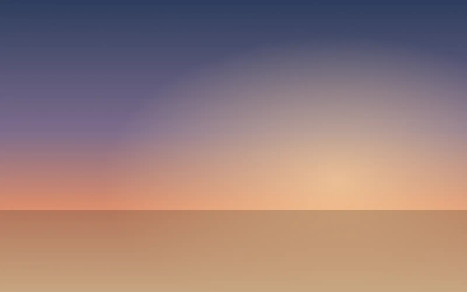 Dawn light breaking warm over a distant ridgeline
